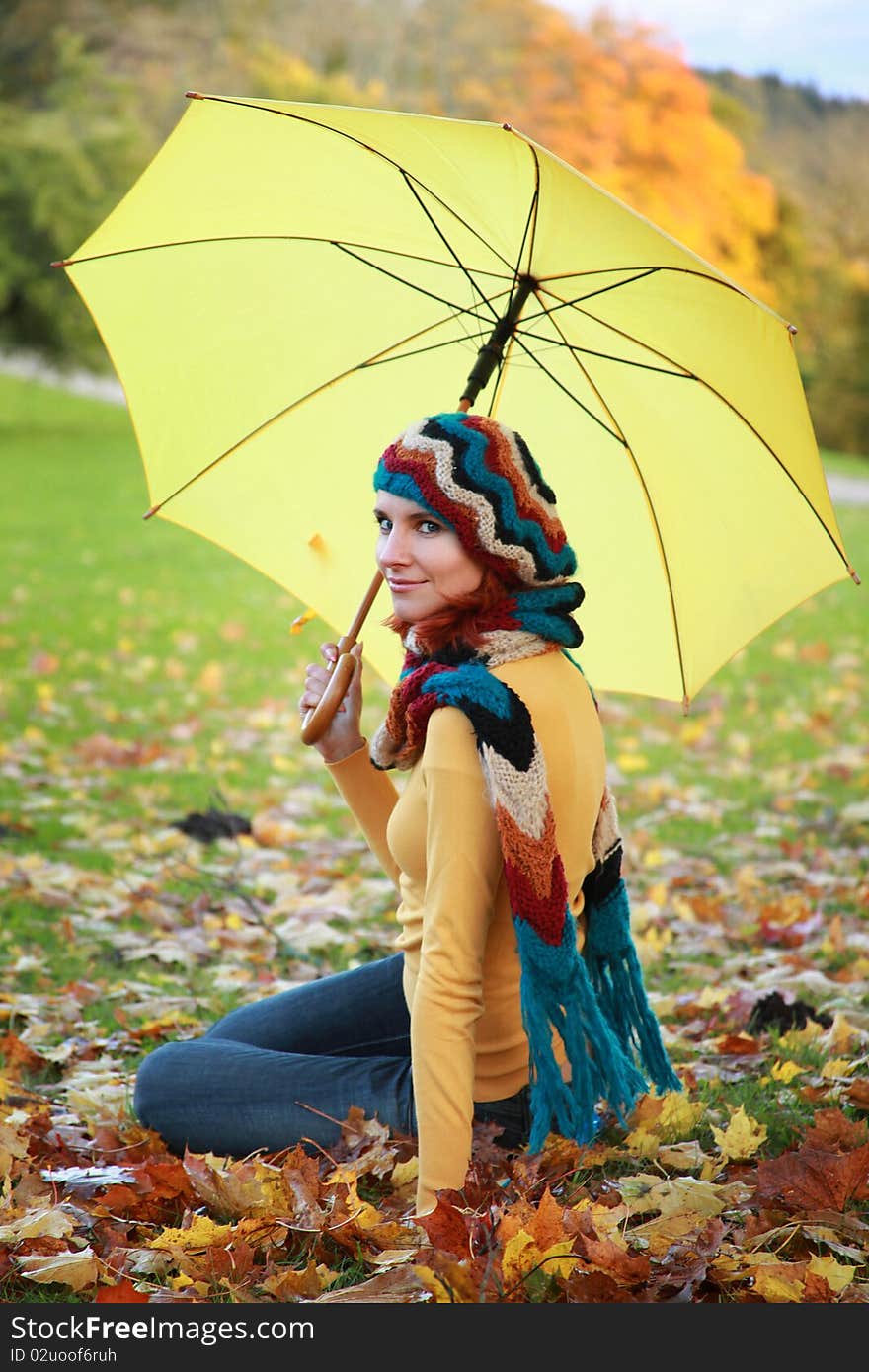 Young girl walking in autumn park. Young girl walking in autumn park