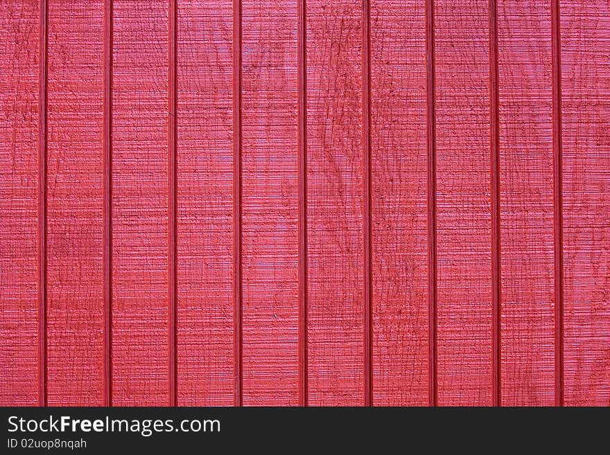 Texture of a red wooden wall.