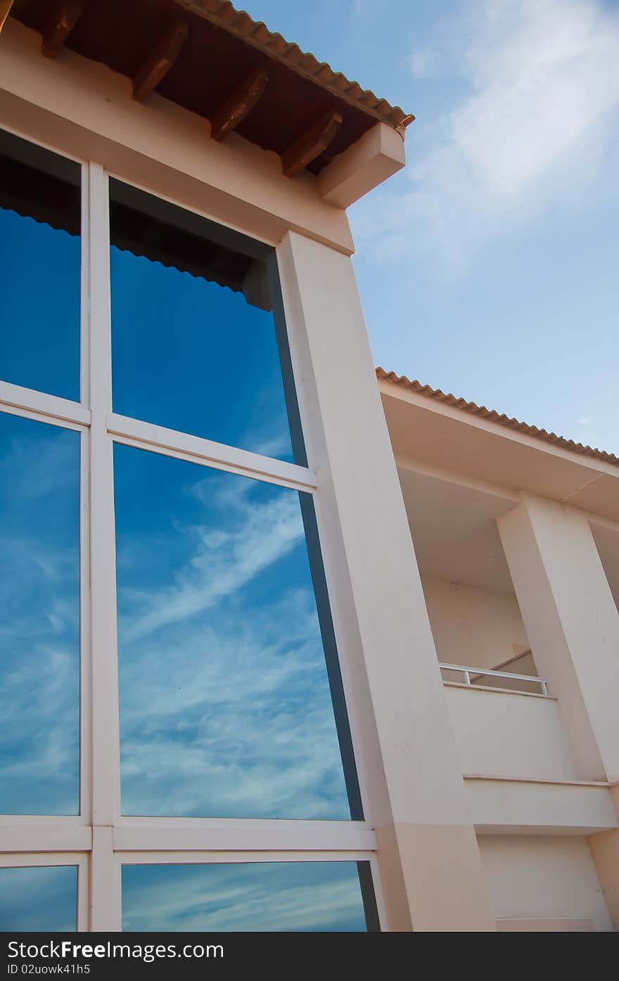 Reflections in the glass of a building hotel