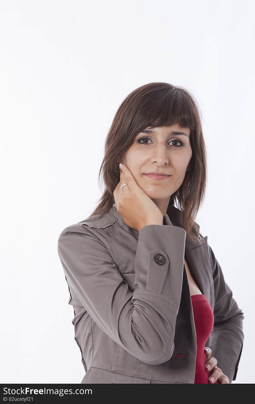 This photo shows a beautifull young girl doing poses on a white background.