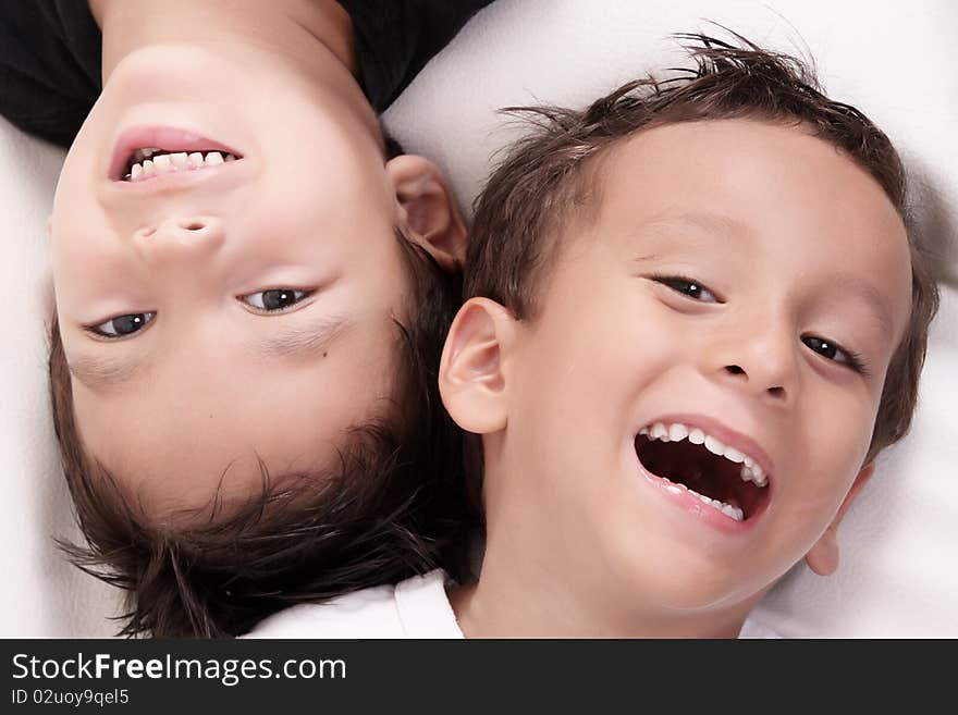 Children smiling and looking at the camera. Children smiling and looking at the camera