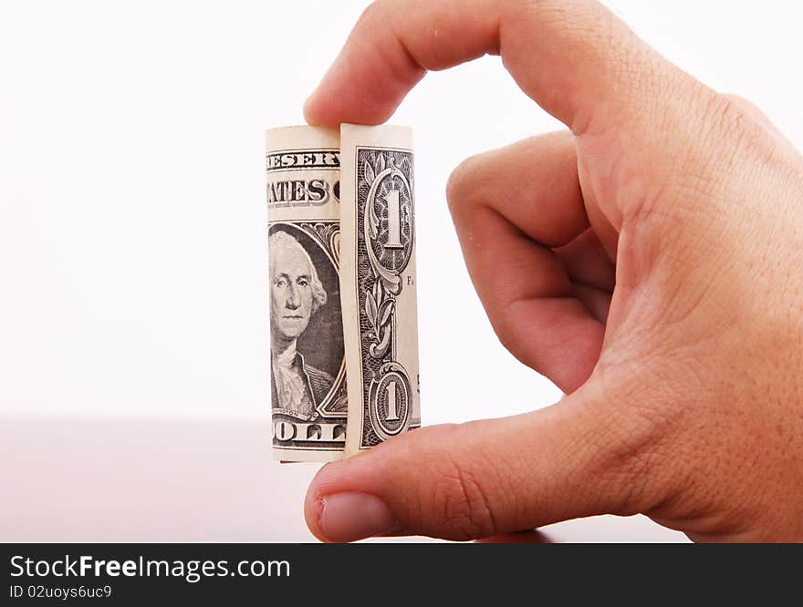 Hand with one dollar roll on white background, Money image. Hand with one dollar roll on white background, Money image