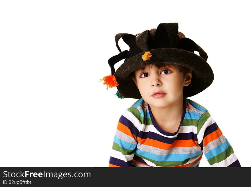 Portrait of pretty little kid in funny hat isolated on white background. Portrait of pretty little kid in funny hat isolated on white background