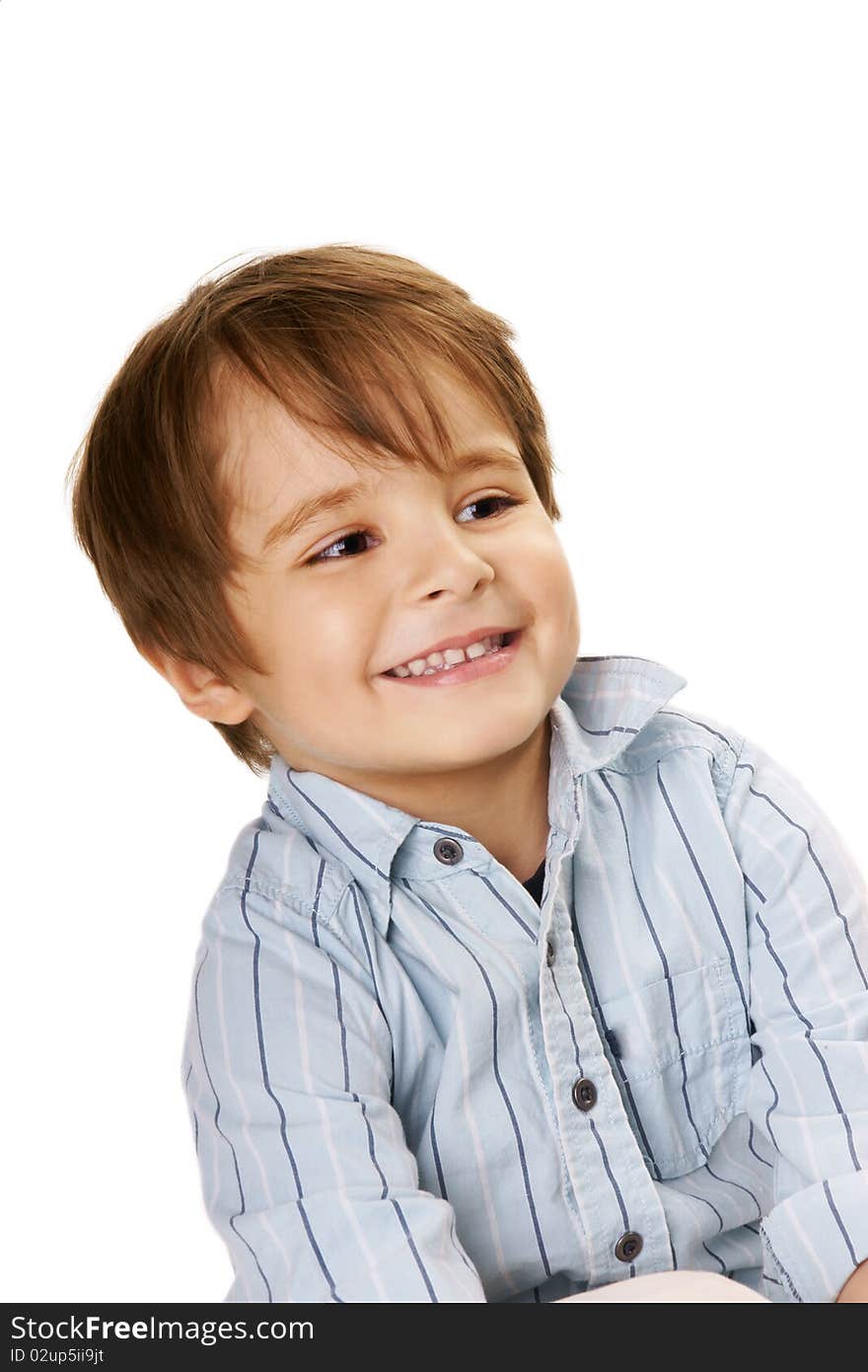 Portrait of little cute joyful boy in blue shirt on white background. Portrait of little cute joyful boy in blue shirt on white background