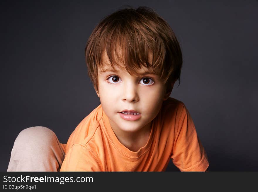 Portrait of cute surprised little boy, studio shot. Portrait of cute surprised little boy, studio shot