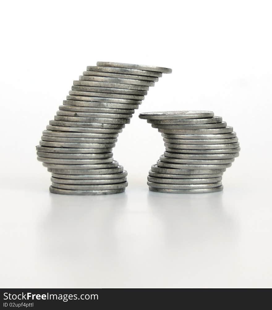 Two Piles of Coins isolated on white background