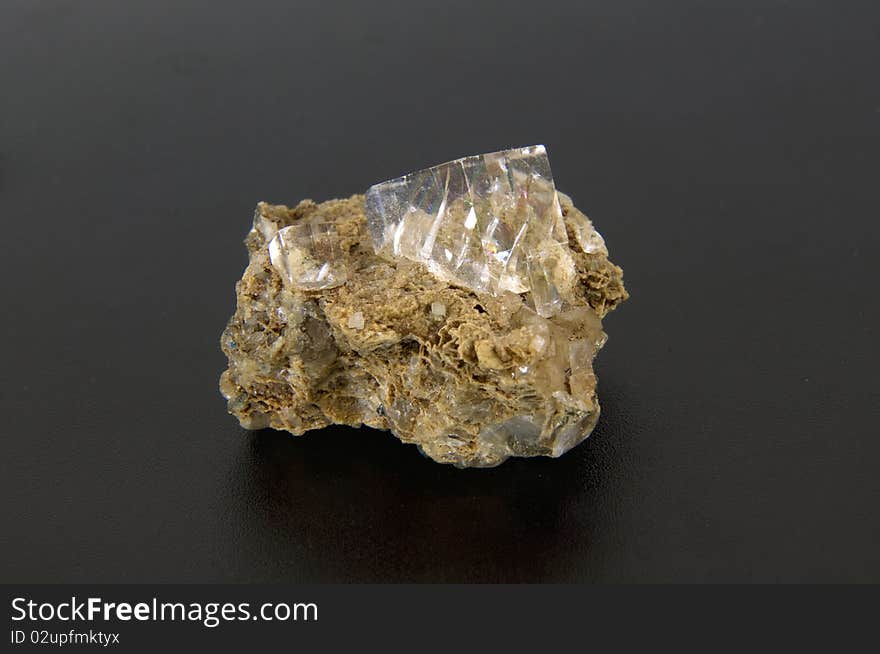 Large calcite crystals on a gray background