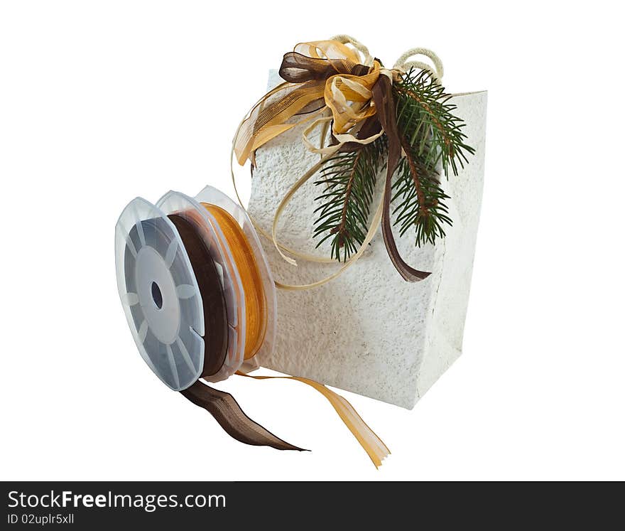 Christmas Package and colored ribbons on a white background. Christmas Package and colored ribbons on a white background