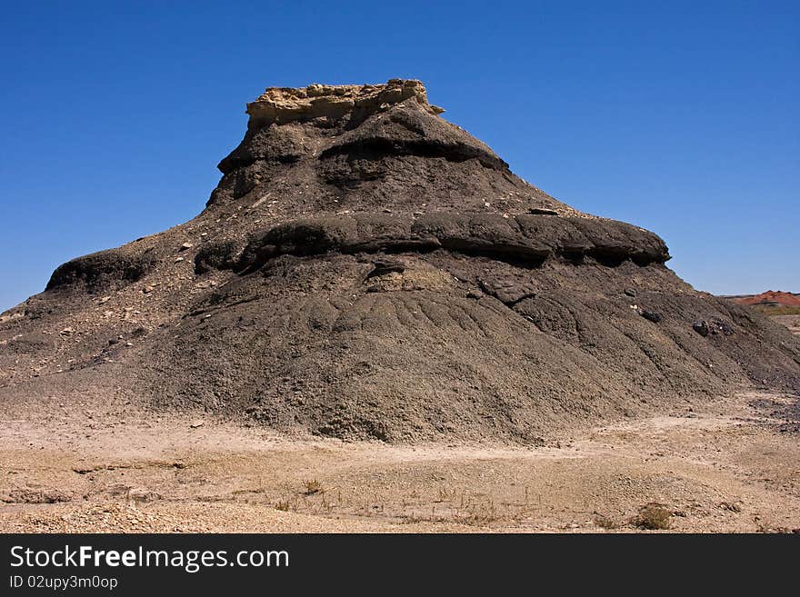 A random rock formation in the Bisti Badland wilderness. A random rock formation in the Bisti Badland wilderness.