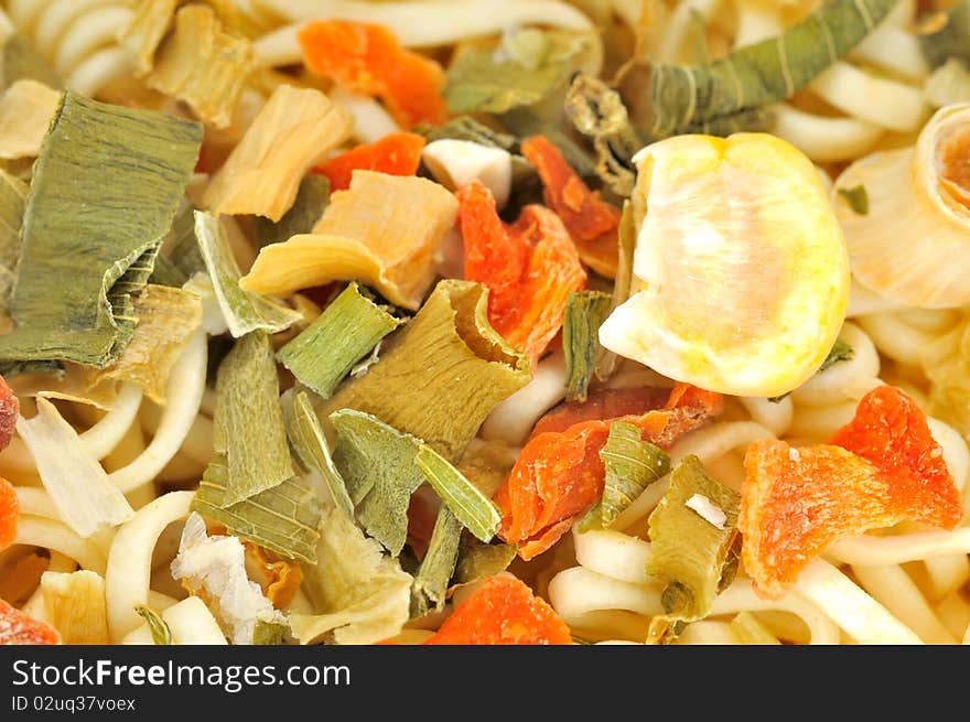 Closeup of dried noodles with ingredients