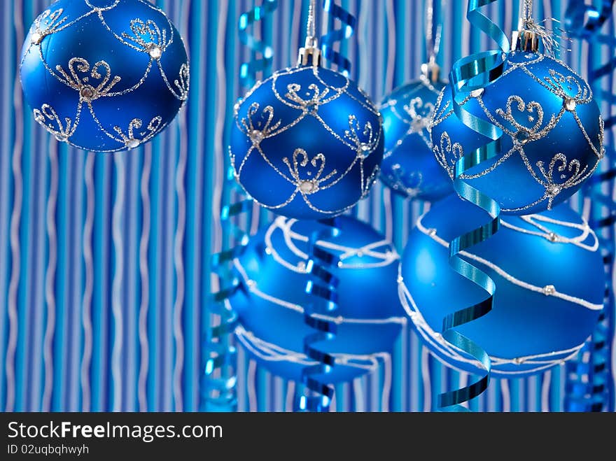 Christmas decoration from blue balls on blue background. Christmas decoration from blue balls on blue background