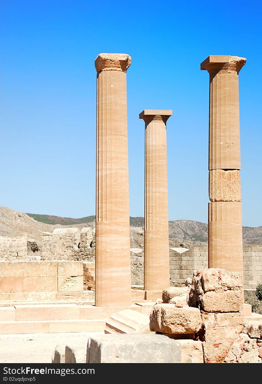 Ancient columns of Acropolis in Rhodes. Lindos city. Greece