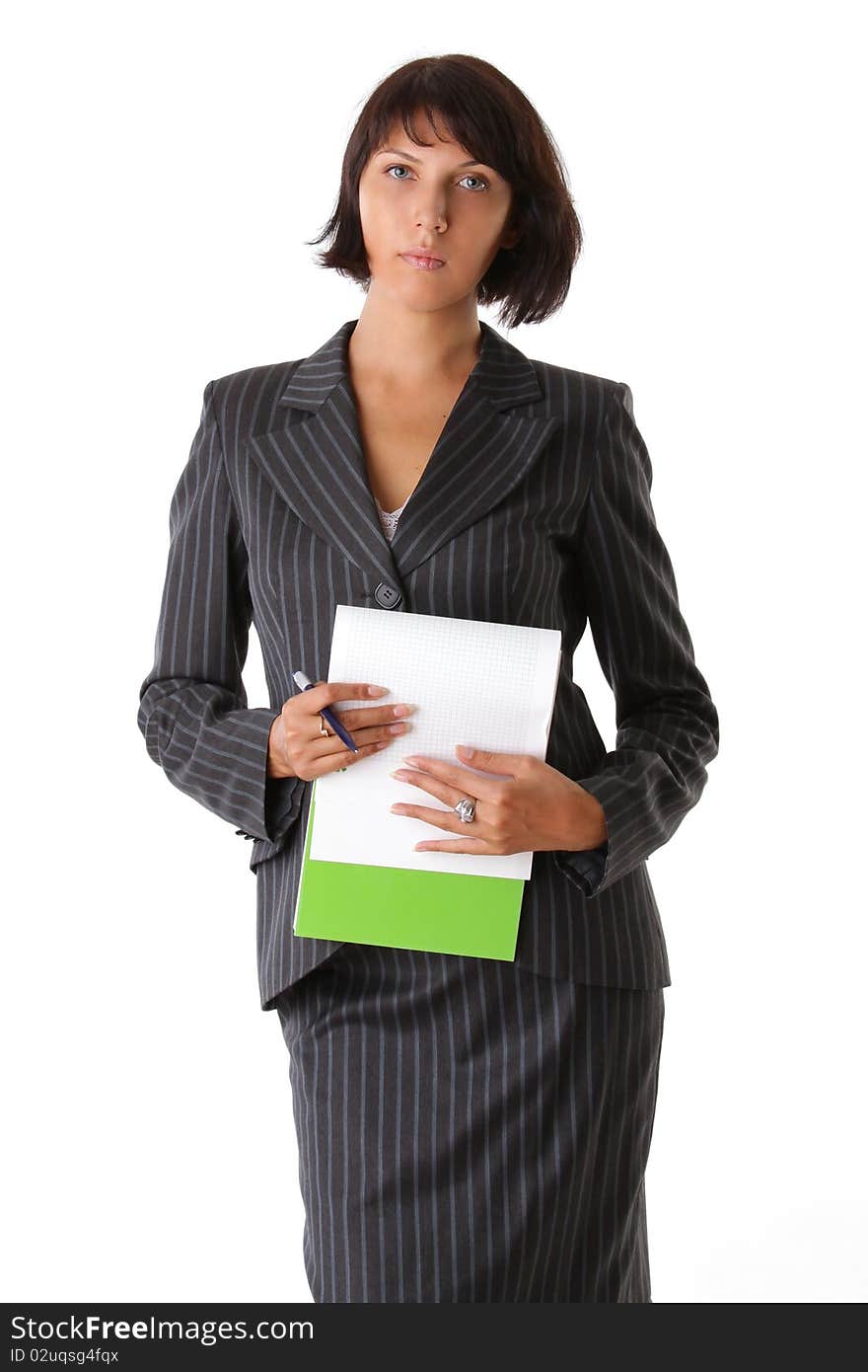 Beautiful woman in suit with notepad and pen