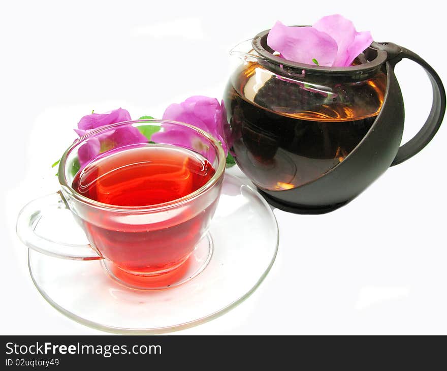 Red tea with wild rose flowers