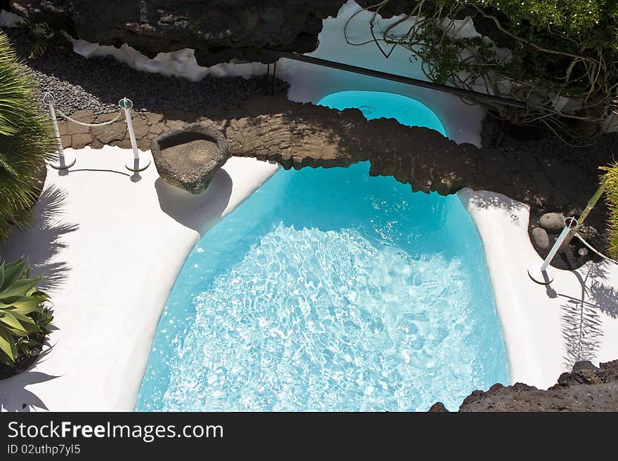 Swimming pool in natural volcanic rock area, Lanzarote,Spain