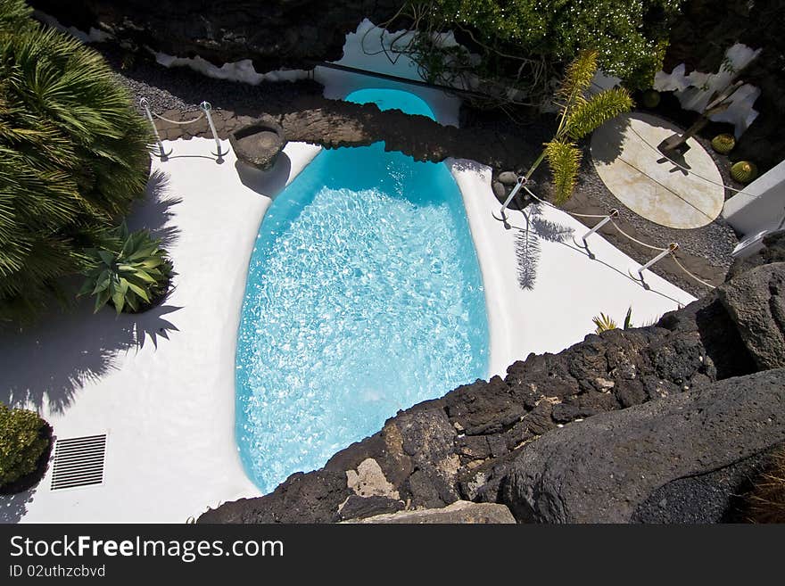 Swimming pool in natural volcanic rock area