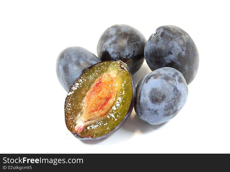 Plums on a white background