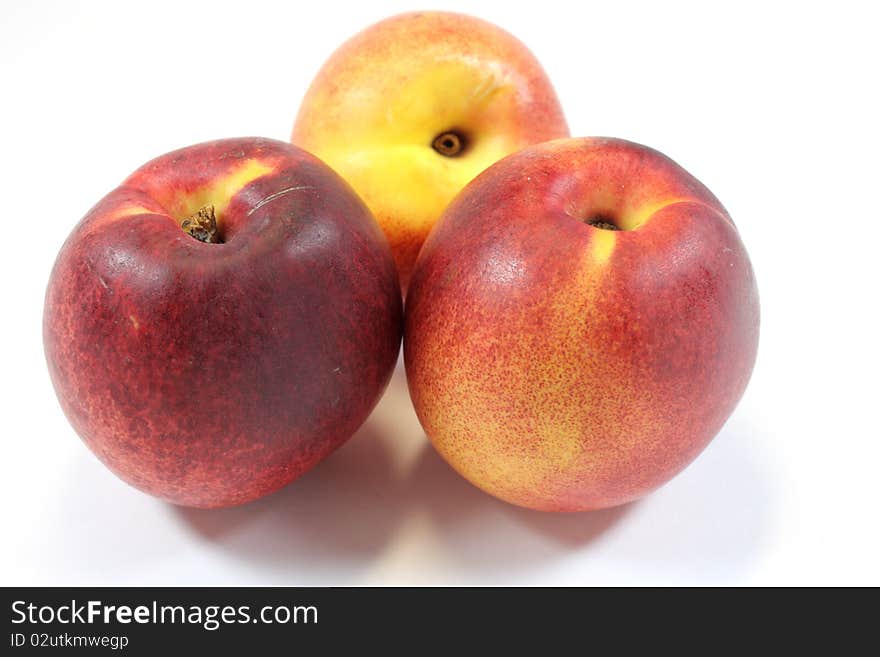 Peaches on a white background