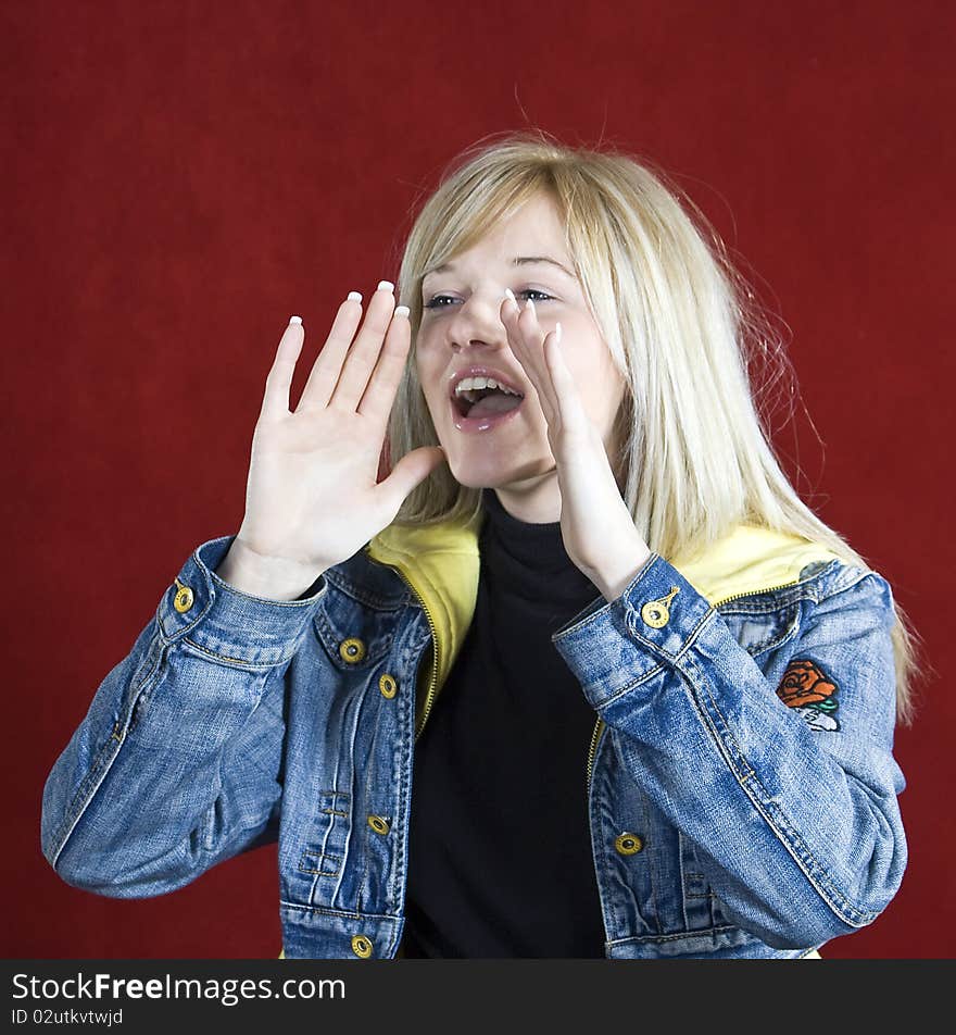 Young blond teenage girl wearing jeans