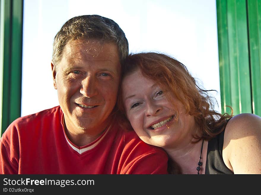 Couple enjoys sitting together