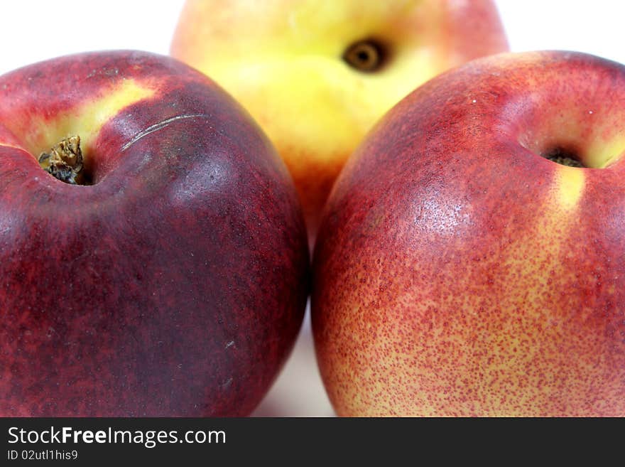 Peaches on a white background