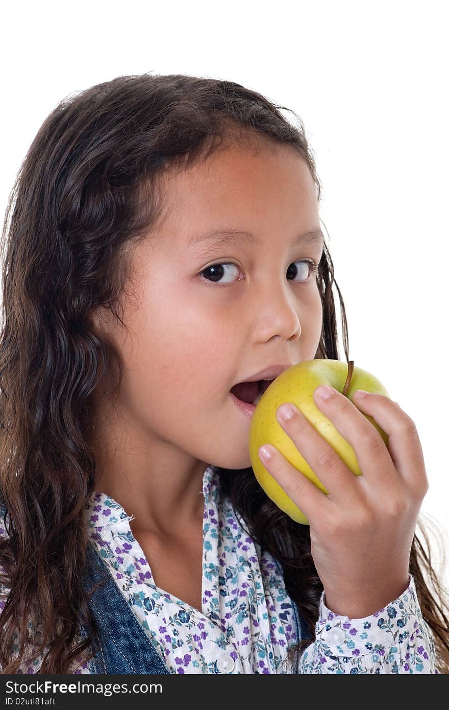 Girl eats apple, healthy food with fruit before white background