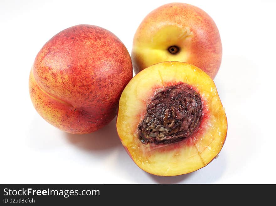 Peaches on a white background