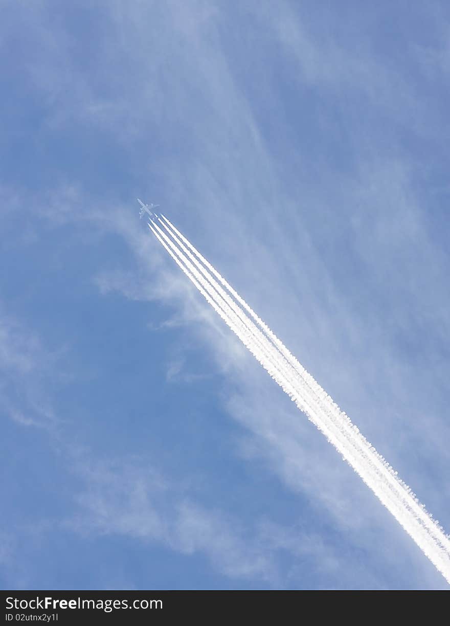 Long airplane trails in the sky