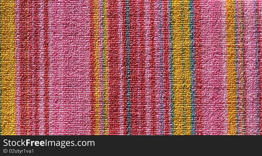 Pretty striped beach towel useful as a background pattern. Pretty striped beach towel useful as a background pattern.