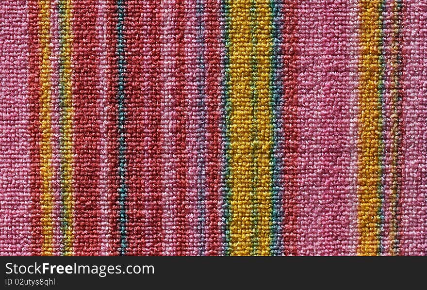 Pretty striped beach towel useful as a background pattern. Pretty striped beach towel useful as a background pattern.