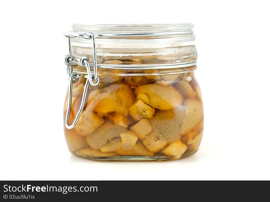 Studio shot of Tinned field mushrooms on white background