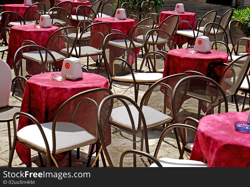 The tables of a cafe in the square in Tropea. The tables of a cafe in the square in Tropea