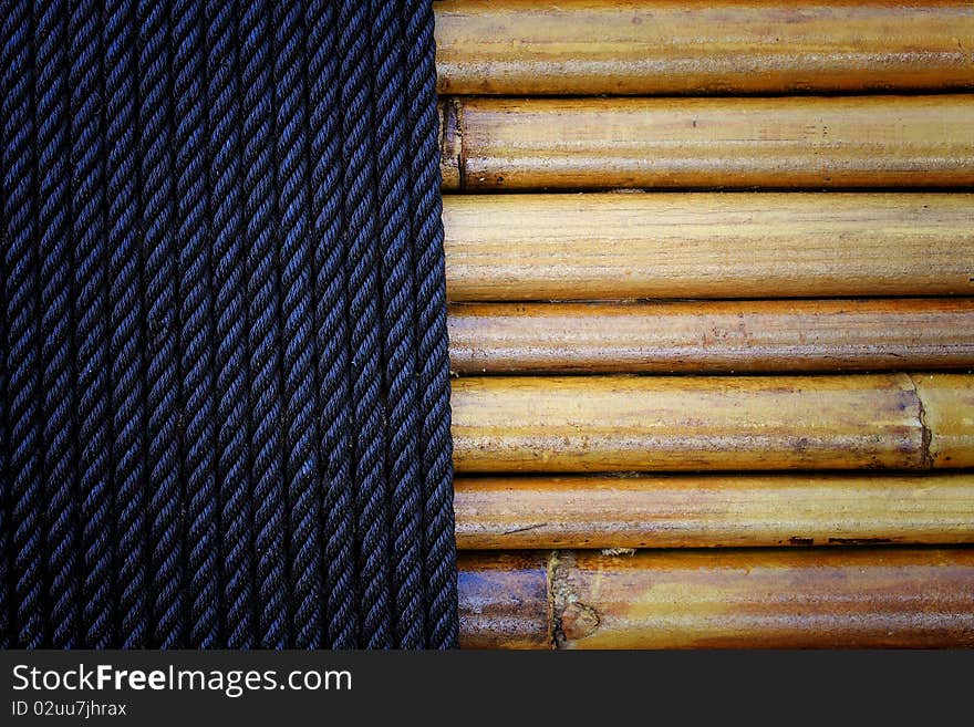 Old bamboo tied with blue rope