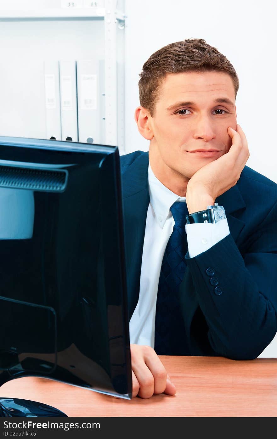 Handsome smiling businessman