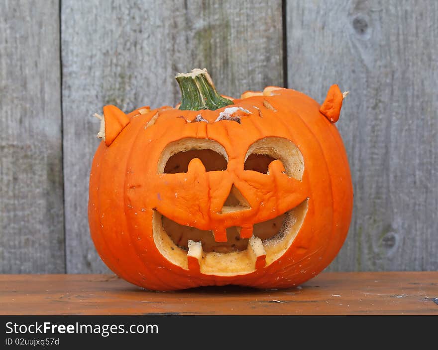 Halloween pumpkin on the bench