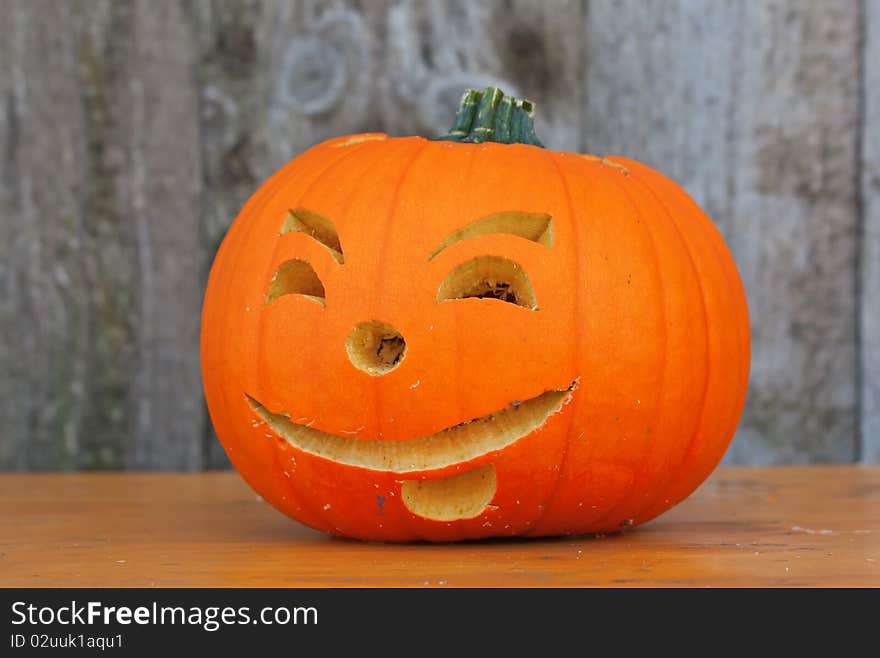 Halloween pumpkin on the bench