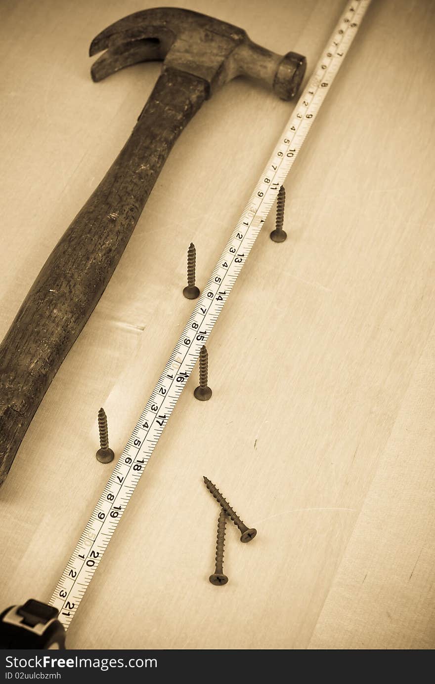 Wood Screws Along Side Tape Measure. Wood Screws Along Side Tape Measure