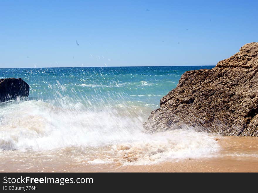 Rocks and atlantic ocean in a beach of albufeira, portugal. Rocks and atlantic ocean in a beach of albufeira, portugal