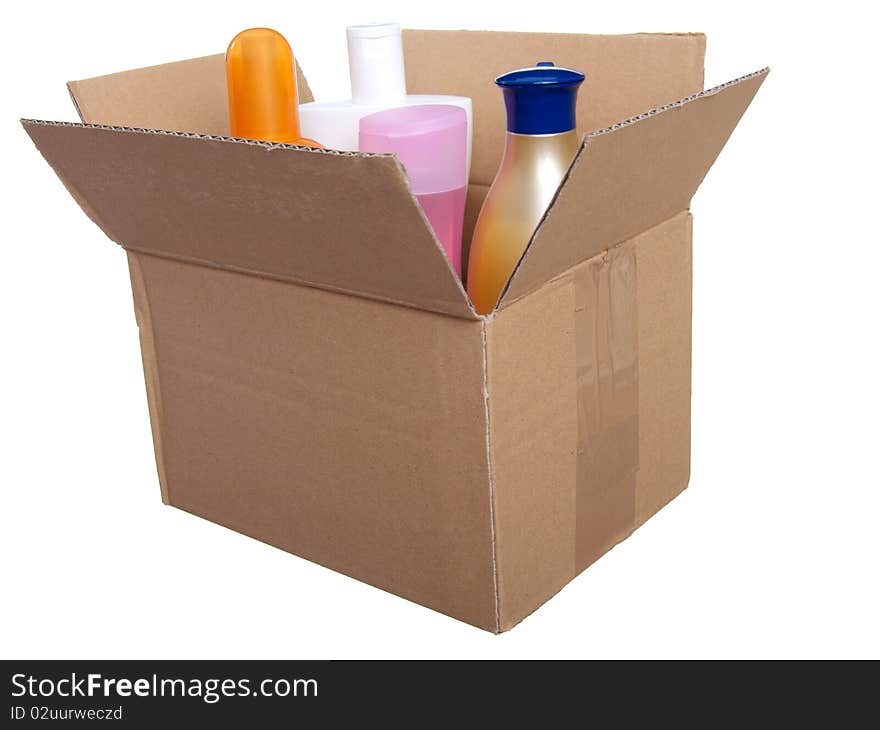 Box with plastic bottle for lotion, shampoo, sunscreen etc in . Isolated on white.