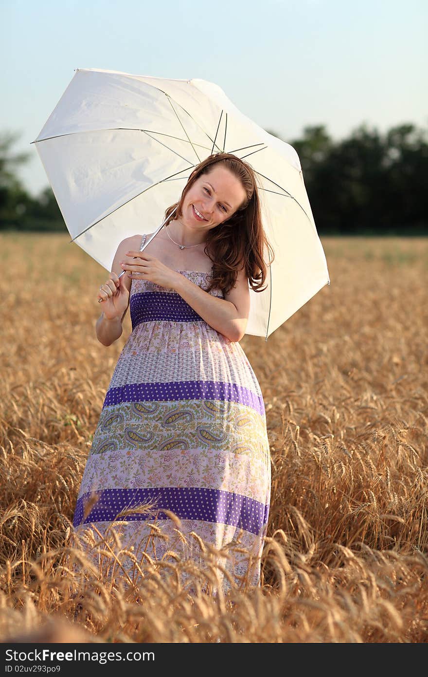 Woman in field of wheat. Woman in field of wheat