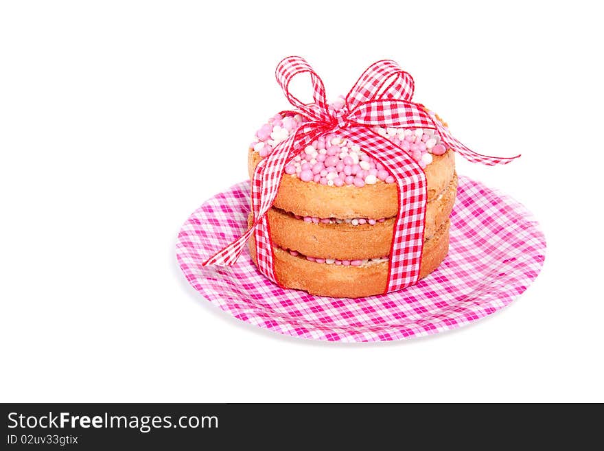 Dutch traditional biscuits with rusks on a small plate isolated over white. Dutch traditional biscuits with rusks on a small plate isolated over white