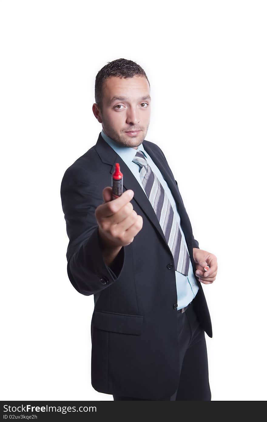 Young businessman with red marker, isolated on white