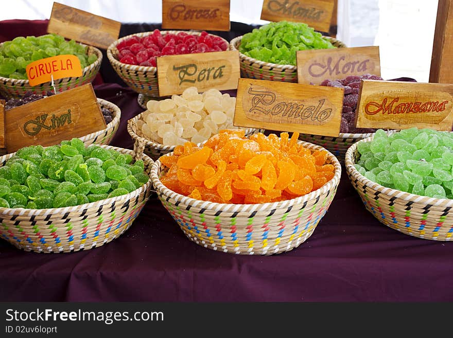 Assortment of colorful candy in wicker basket