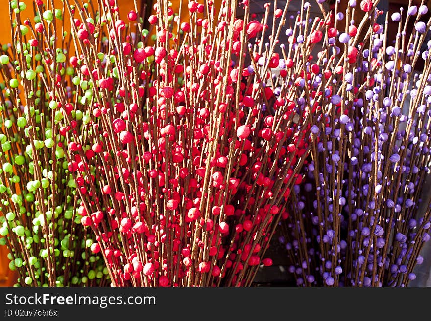 Textures with colored paper flowers