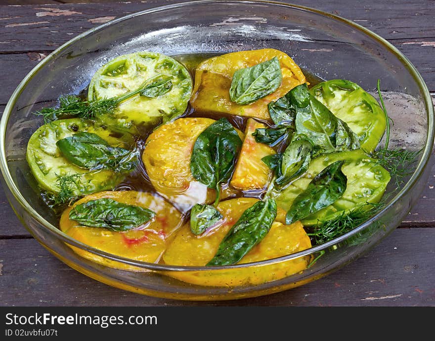 This is an image of marinated heirloom tomatoes.