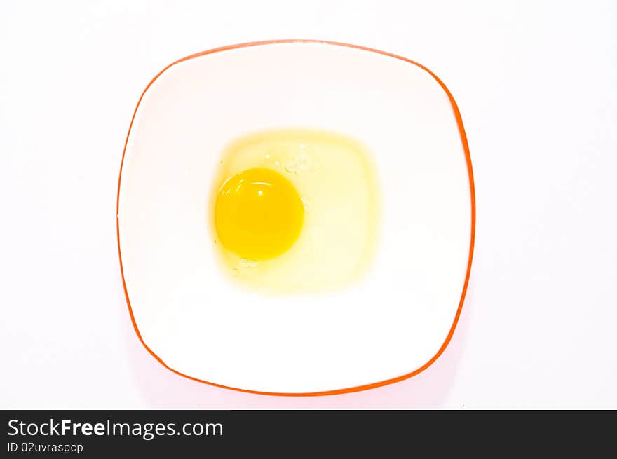 Egg in white bowl