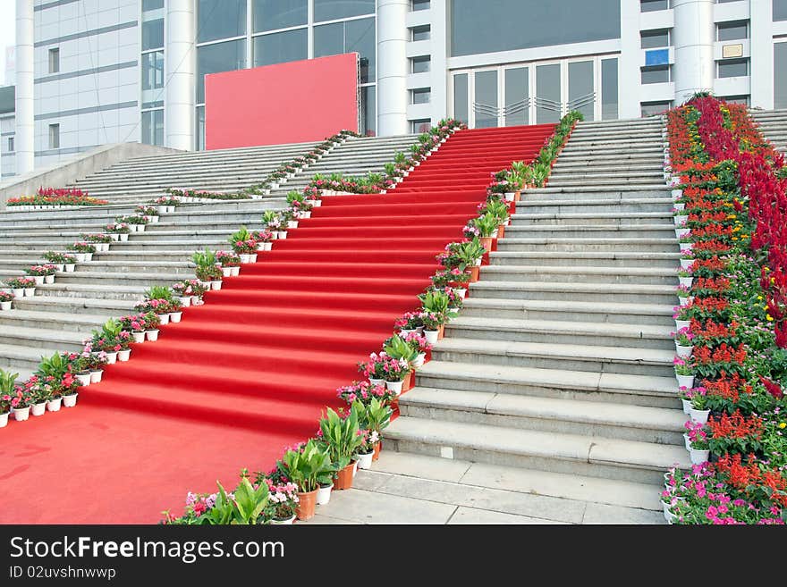 Red carpet and marble staircase