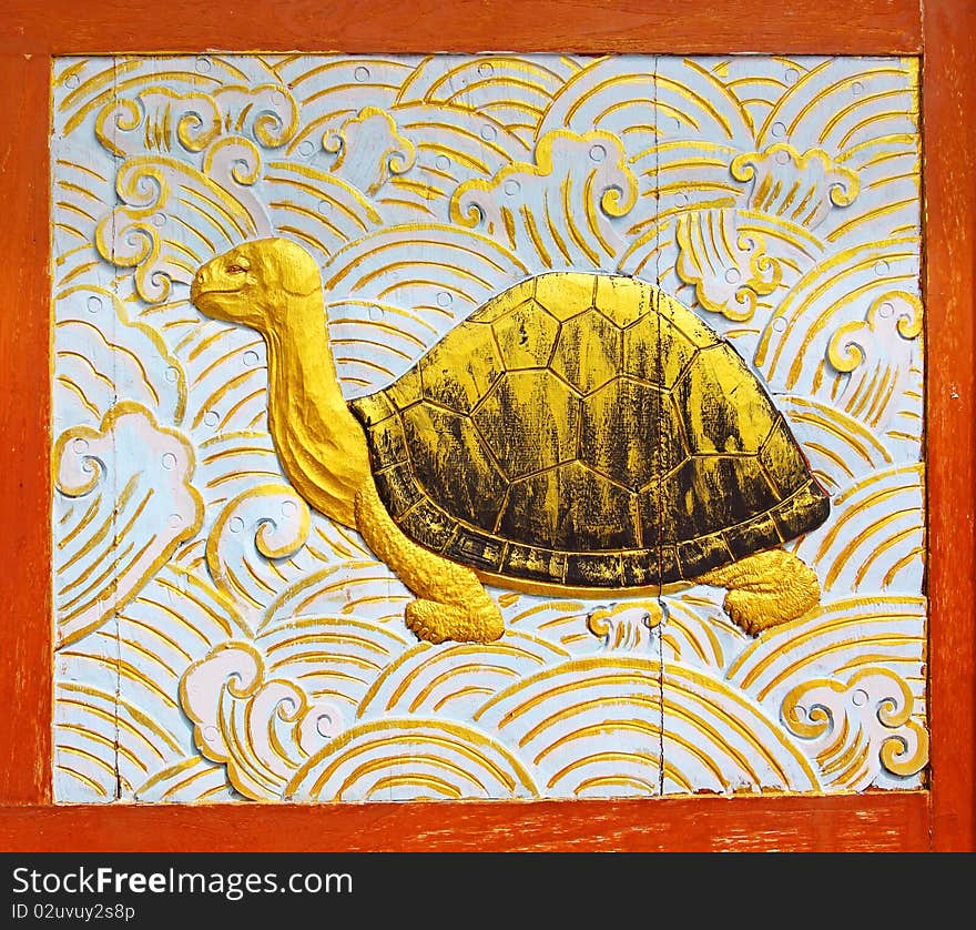 Turtle wood carving background gold colour