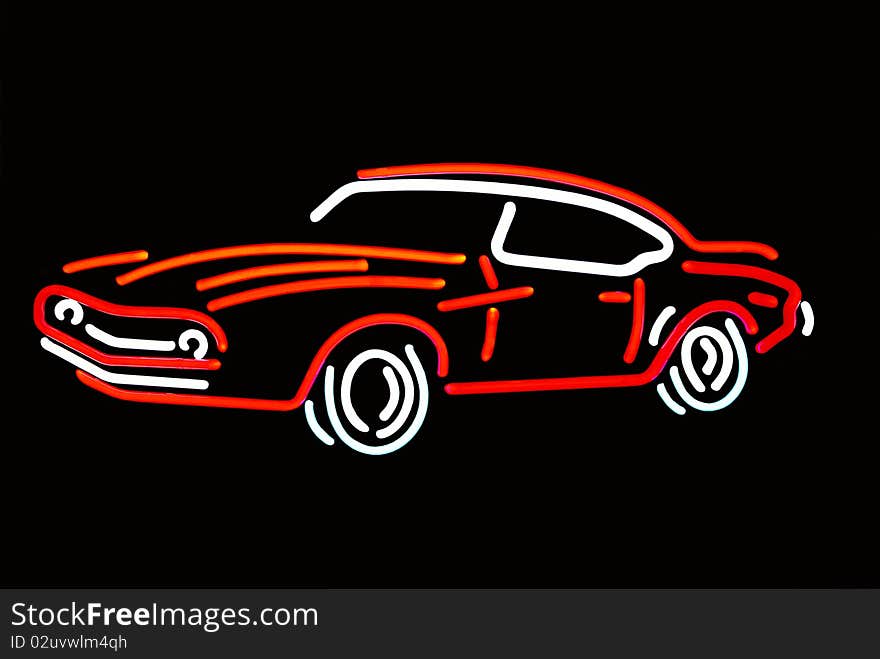 Red and white neon outline of a sporty classic car. Red and white neon outline of a sporty classic car.