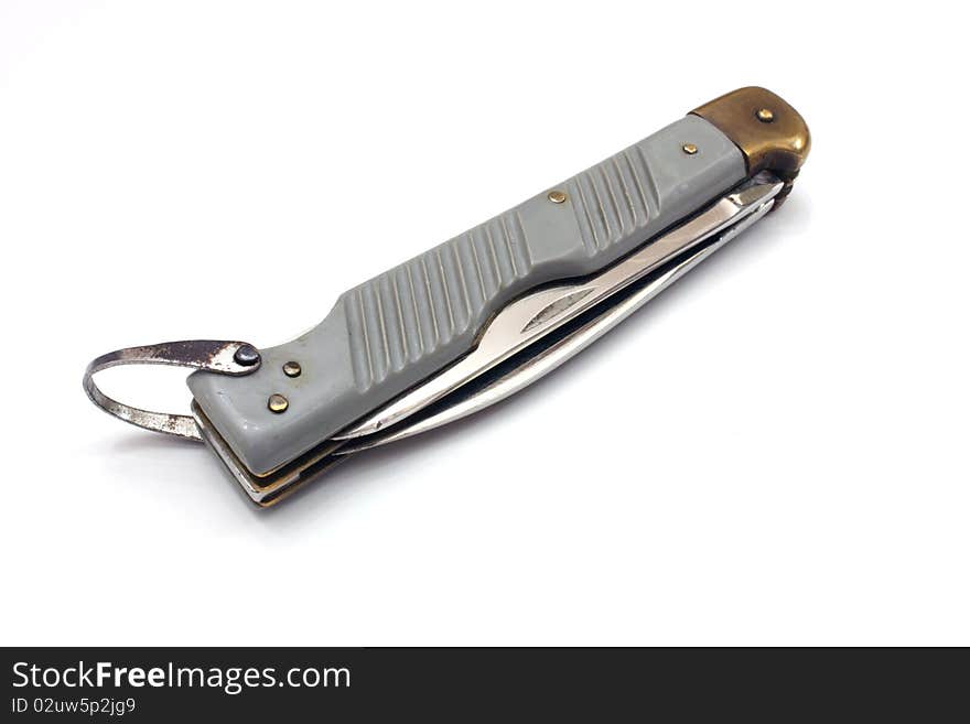 Aviation folding knife with an edge and a saw of gray color with a loop for fastening. Aviation folding knife with an edge and a saw of gray color with a loop for fastening